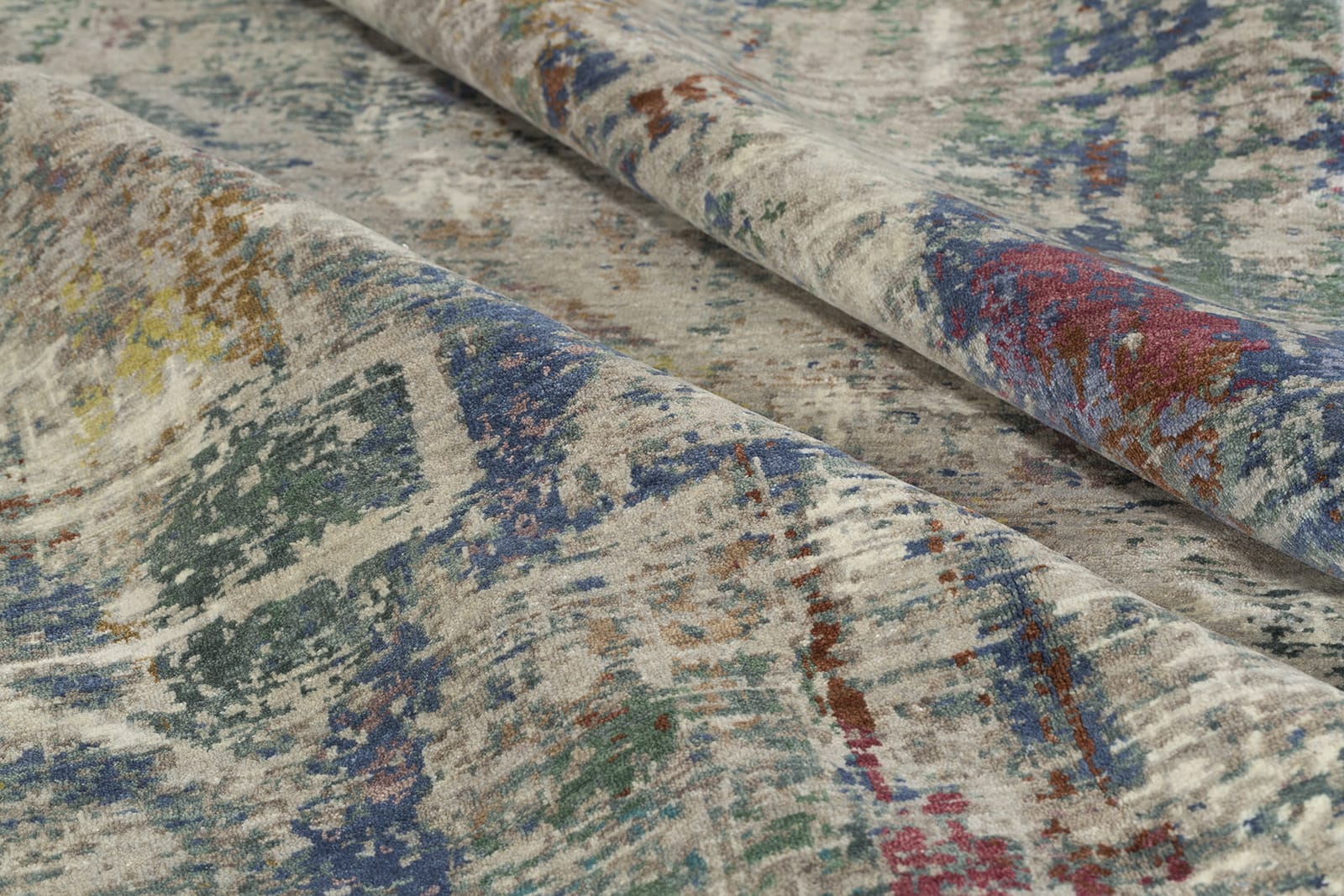 detail image of City Lights V Grey Multi hand knotted area rug design by Tufenkian