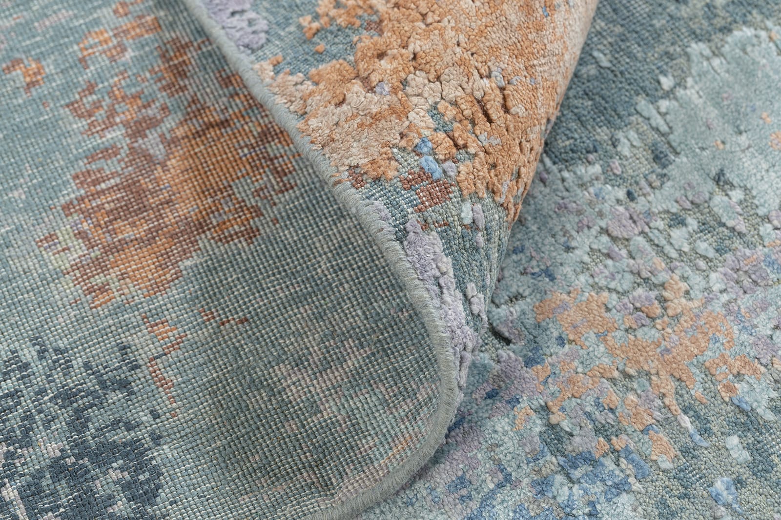 detail image of Niche Blue hand knotted area rug design by Tufenkian