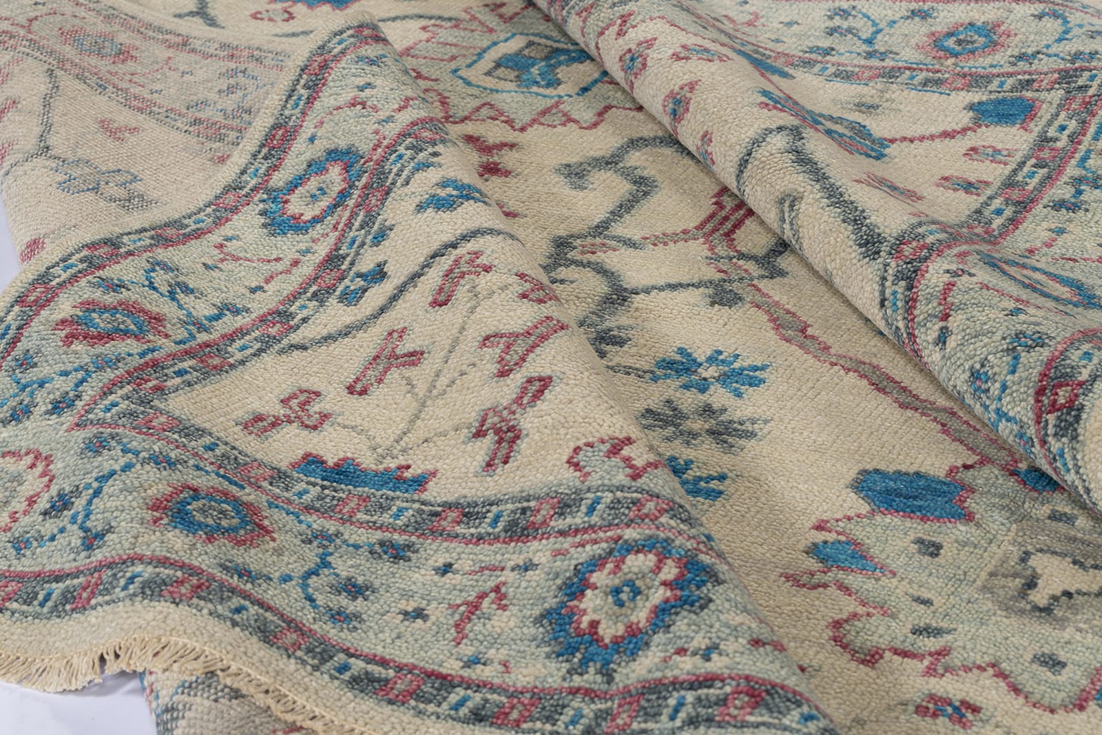 detail image of Donegal III Ivory Rose hand knotted area rug design by Tufenkian
